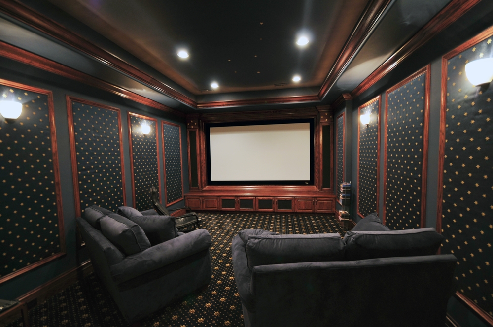 Home Theatre. After Basement Remodeling. Projector Screen and Nice Seats. Elegant Home Theatre Basement Los Angeles- Onboard IT Tech