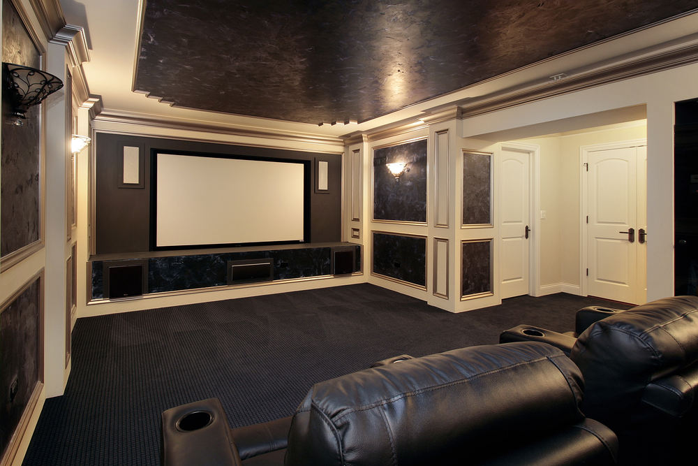 Theather room in luxury home with leather chairs Los Angeles- Onboard IT Tech