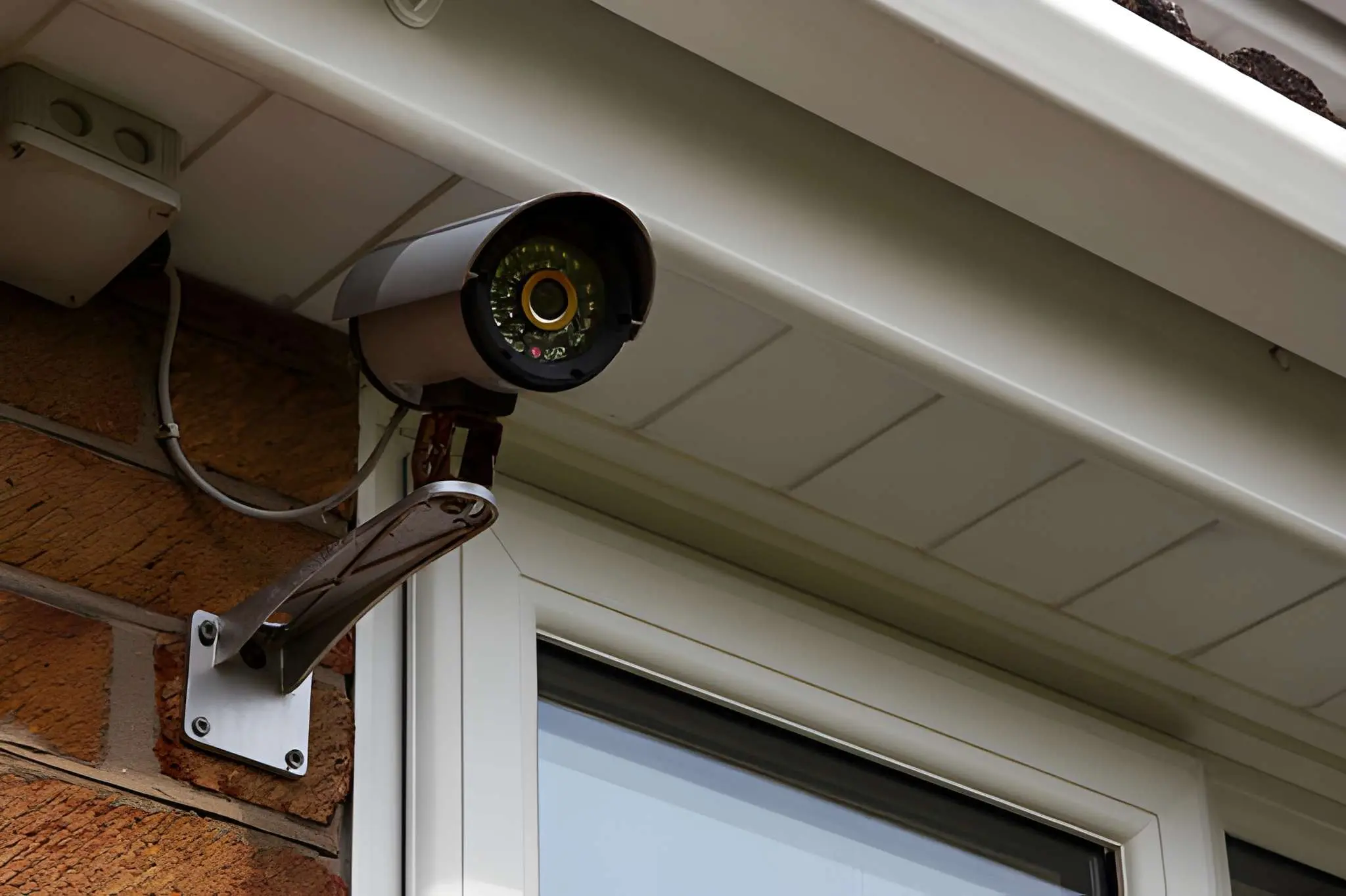 Residential Security System Installation in Granada Hills showing a home with modern cameras and smart access control.